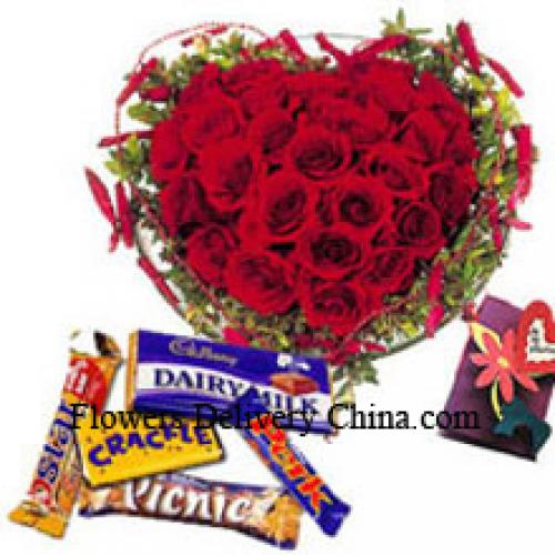 Hartvormige 40 rozen met assortiment chocolaatjes